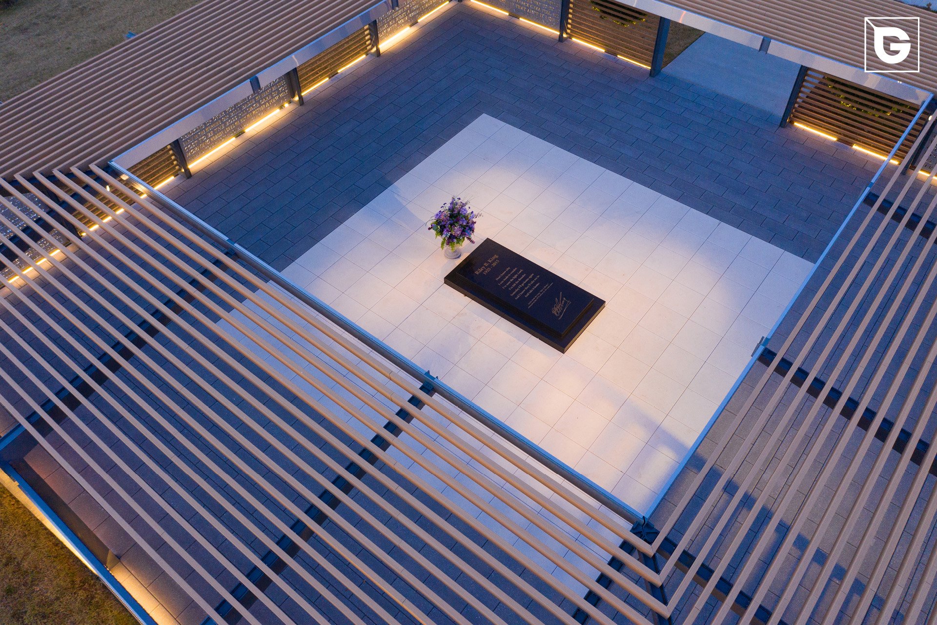 Geolam composite louvers — BB King Museum, aerial courtyard view at dusk