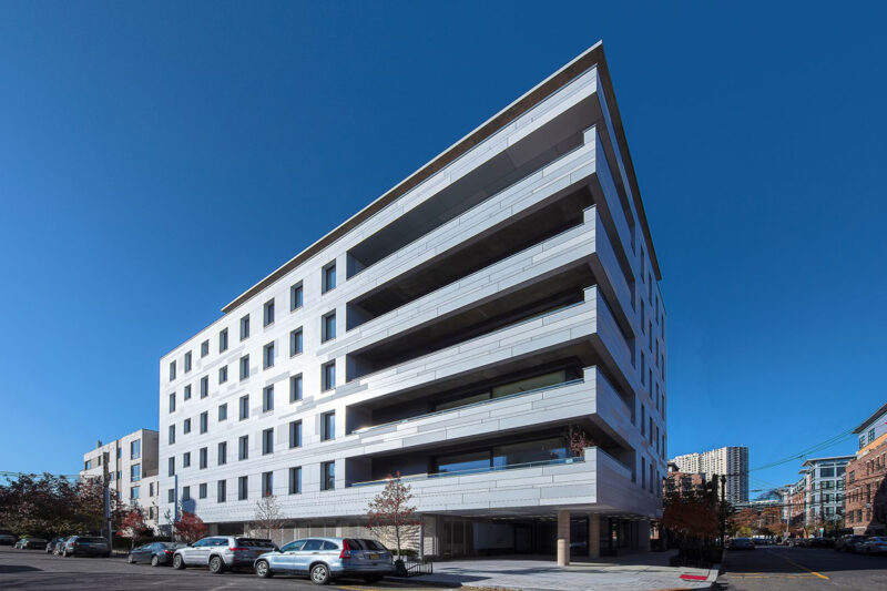 Petrarch engineered stone cladding — residential apartment building facade