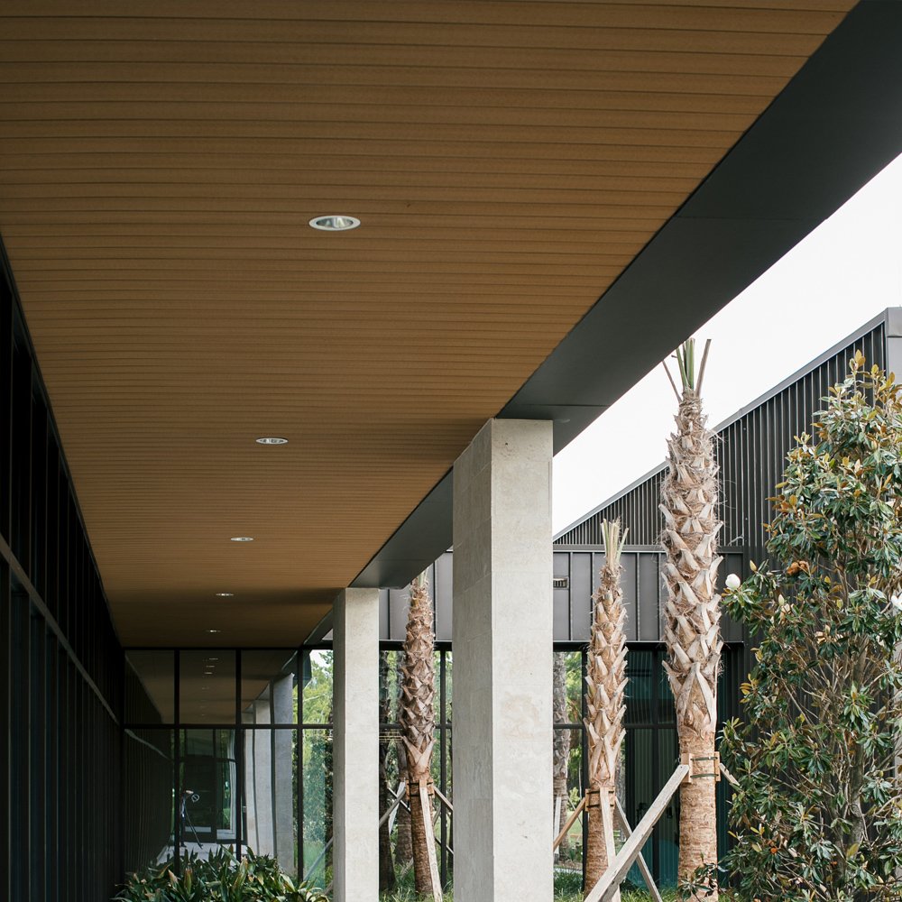 Geolam decking — rooftop terrace at dusk, urban setting